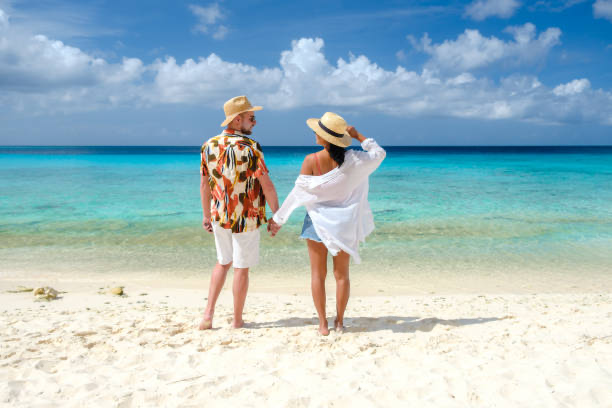 Couple walking on a resort beach